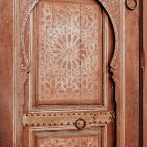 Hand carved door with ornate pattern