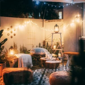 Outdoor cushions and rugs coffee table and lanterns