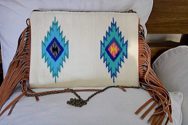 white Aztec shoulder bag with chain and suede fringe