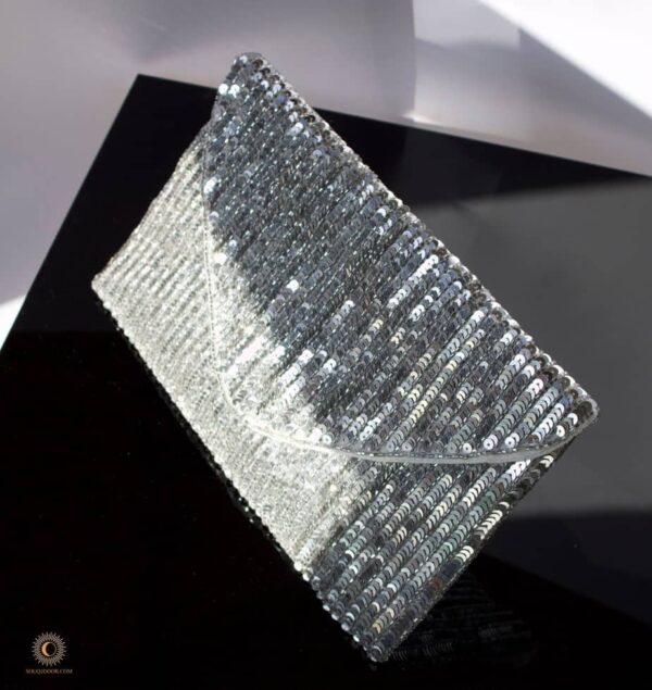 silver sequined clutch