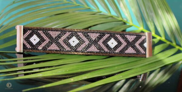 Beaded cuff displayed on side