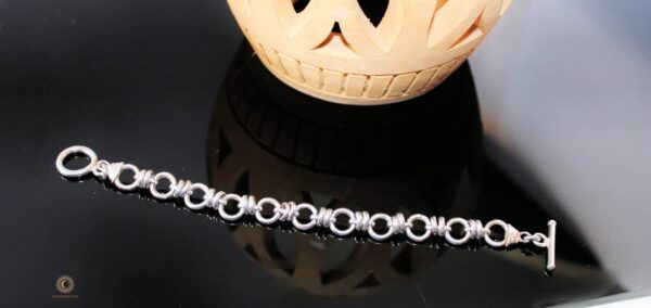 Silver circular interlocking bracelet