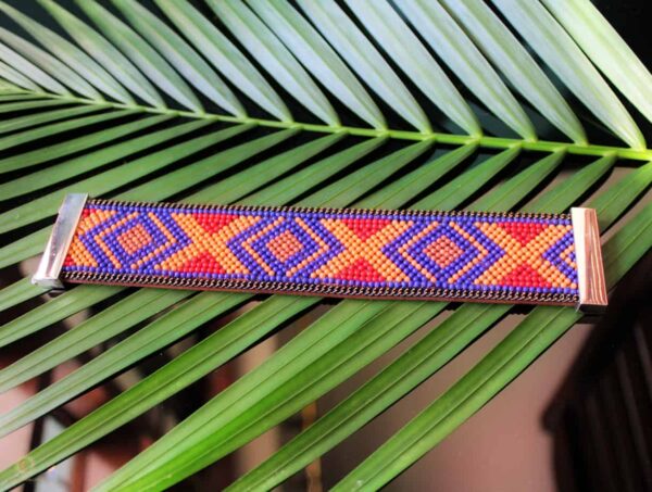 Boho Cuff displayed flat in midnight blue and burnt orange