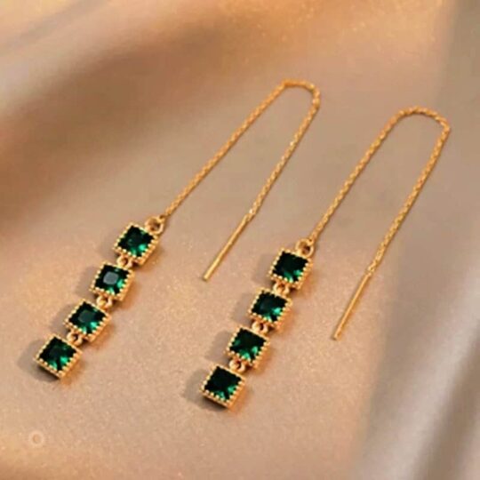 long thread earrings gold in colour with green crystal
