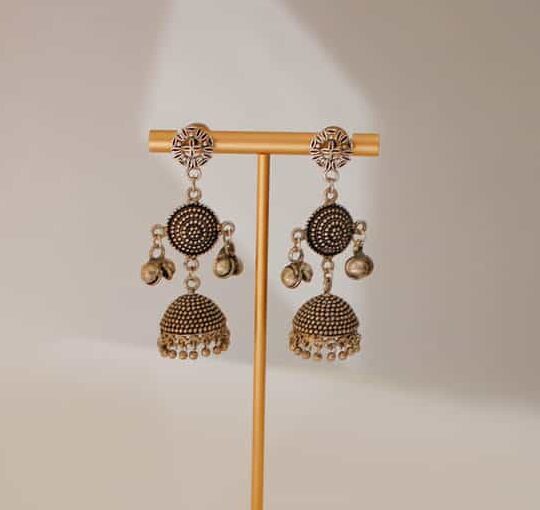 Elegant traditional silver earrings with intricate jhumka design, perfect for festive and casual occasions, available at Souq2Door.