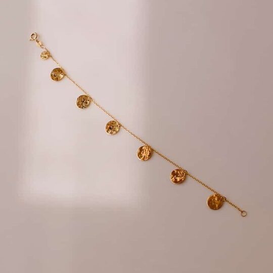 Gold hammered disc bracelet