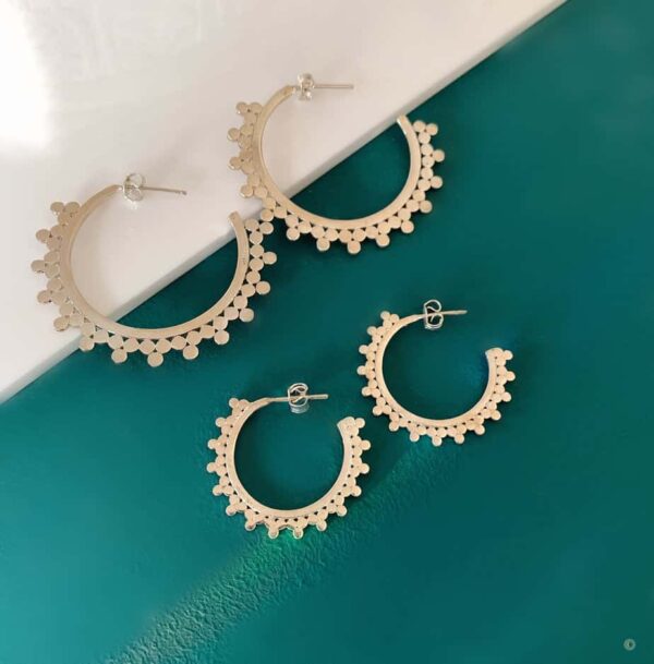 Large and small silver hoops