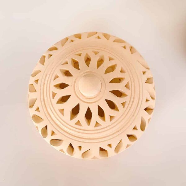 Arabic pottery with carved cut outs Bahrain pottery.