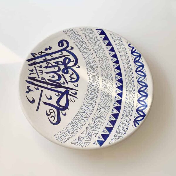 Wall hanging plate with blue and white calligraphy