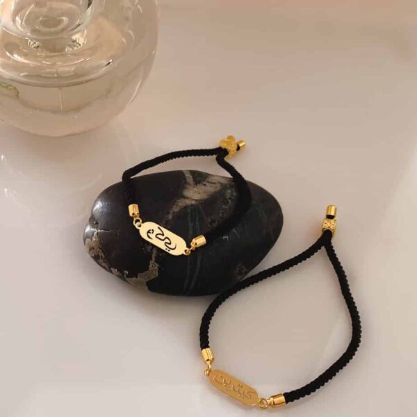 Arabic script name bracelets in gold