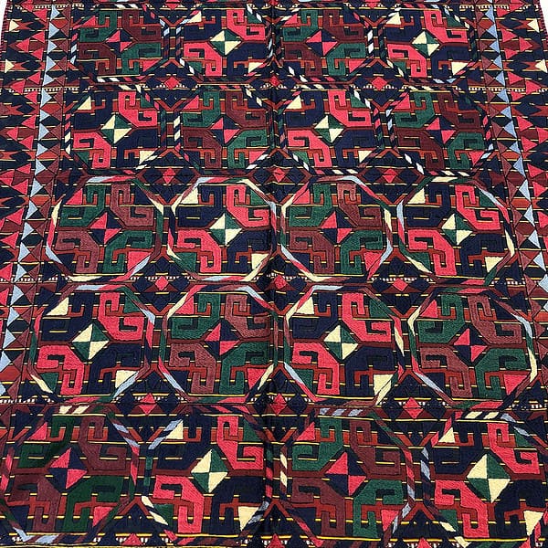 Rug from Uzbekistan this is a tribal interlocking area rug, this is an unclose look at the intricate pattern made with a kilim