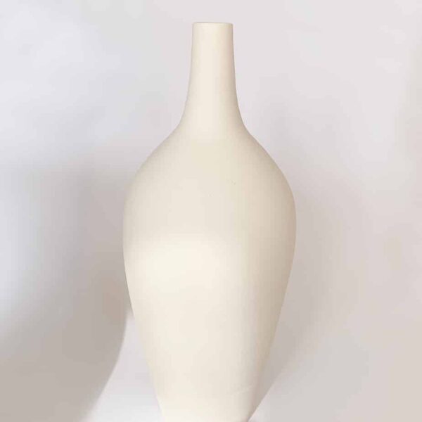 Modern shaped white ceramic pottery made in Bahrain.