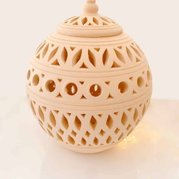 Ceramic and pottery lantern this is a large round pottery lantern made in Bahrain.