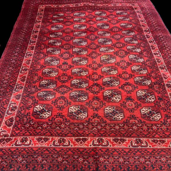 Large Vintage Red Rug this is a Turkmen tribal rug from Afghanistan