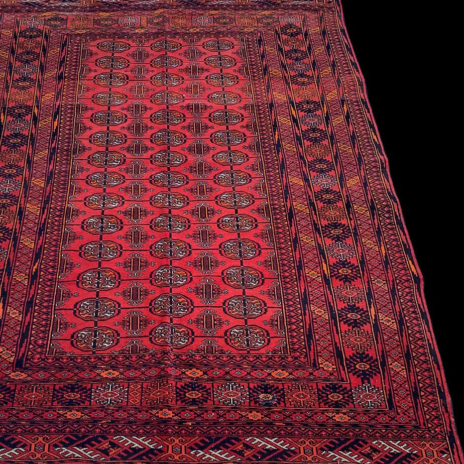 Handmade rug from Afghanistan this is a herati medium size red rug