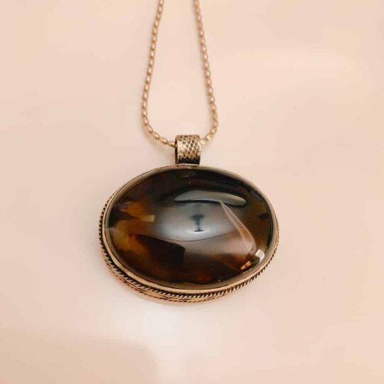 large brown oval agate necklace with a silver chain