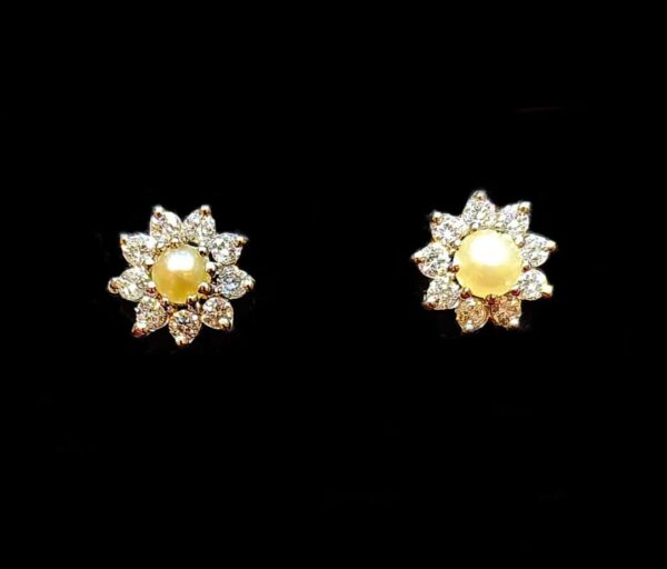 Pearl and Diamond Earrings, they contain pearls from Bahrain and diamonds stud earrings