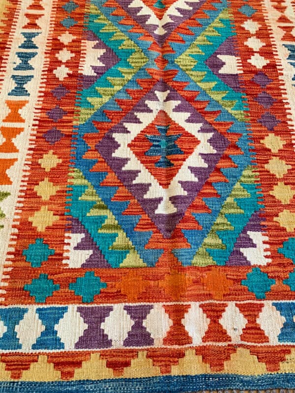 Kilim Rug - Handmade in Afghanistan - Tribal pattern warm area rug