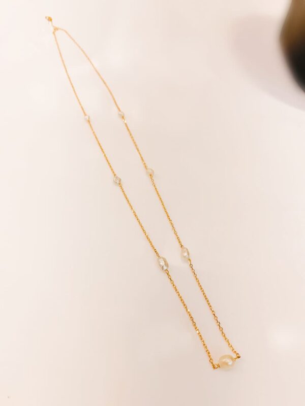 Gold and Pearl Necklace made with Bahraini pearls and the gold is gold.