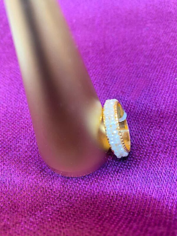Modern style ring with two rows of pearls