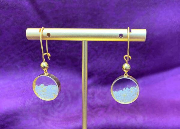 Pearl drop dangle earrings made with natural pearls and gold.