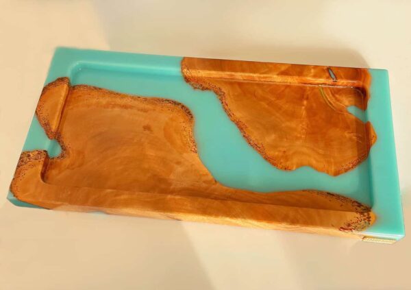 Elegant wooden and resin serving tray, perfect for home decor and serving food.