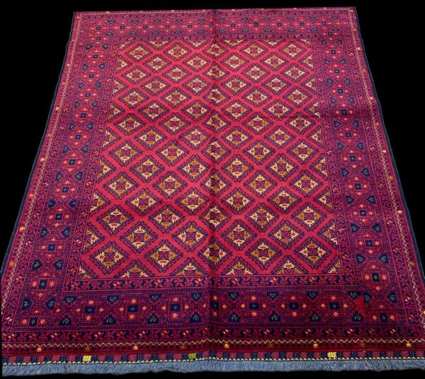 Authentic handmade oriental rug featuring intricate patterns and detailed craftsmanship.