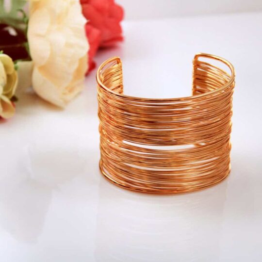 ladies boho Cuff Bracelet multi strand and gold plated.