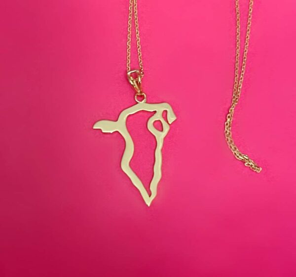 Elegant gold Africa map pendant necklace, perfect for stylish accessories and cultural jewelry lovers.