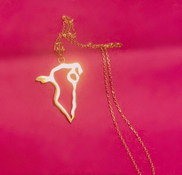 Gold necklace featuring a pendant in the shape of Brazil with a stylised human figure inside.