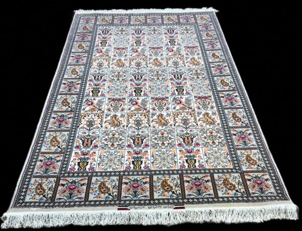 Elegant Persian-style rug featuring intricate floral and geometric patterns in vibrant colours, ideal for enhancing home decor and adding a touch of luxury.