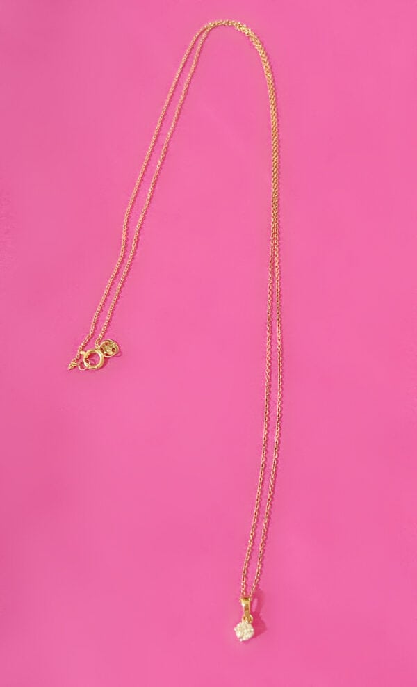 Gold necklace with a diamond pendant