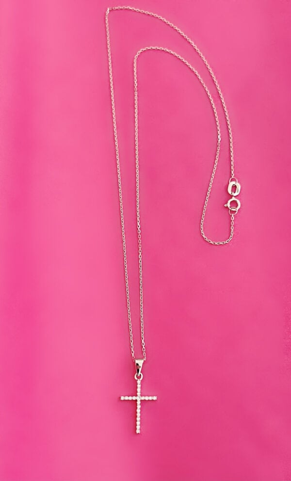 Diamond Cross necklace made with white gold and diamonds