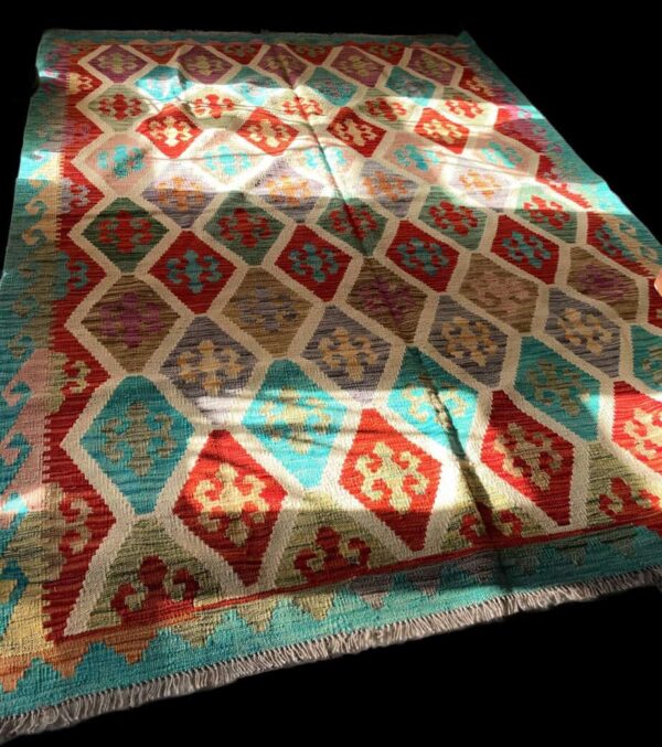 Multicoloured traditional woven rug with geometric patterns, ideal for home décor and oriental interior design, featured on Souq2Door.