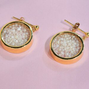 Earrings made with natural pearls from Bahrain and gold.