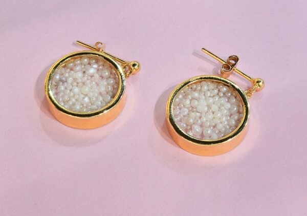 Earrings made with natural pearls from Bahrain and gold.