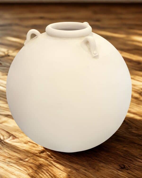 Handmade ceramic vase with a smooth matte finish, perfect for home decor or gifting. Suitable for decorating living spaces, offices, or as a centerpiece in modern interior designs.