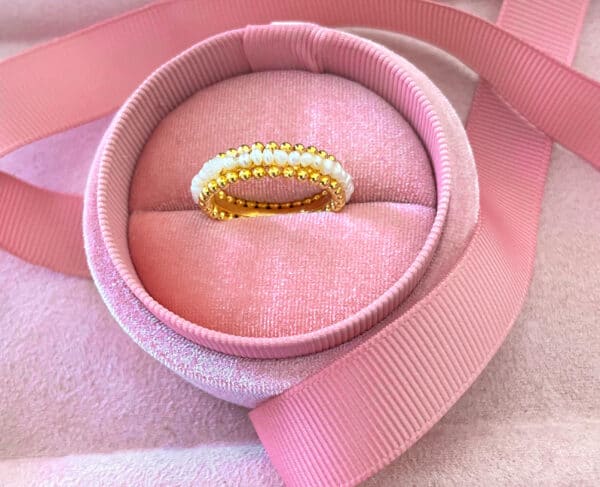 Pink velvet ring box with pearl and gold ring, perfect for gift or special occasion, luxurious jewellery storage, romantic gift idea, feminine design, wedding or anniversary gift.