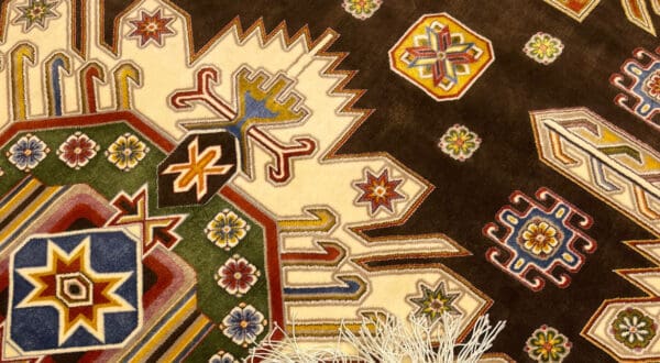 Luxurious Persian Silk rug featuring detailed geometric designs and floral elements, ideal for enhancing living rooms or bedrooms. Made from premium materials, it combines style with durability for a timeless interior accent.