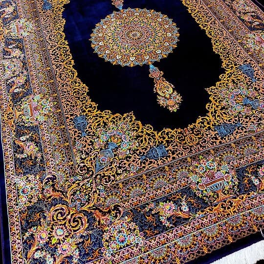 Elegant Persian rug featuring intricate floral patterns and vibrant colours on a deep Royal Blue background. Perfect for adding luxury and cultural charm to any living space.