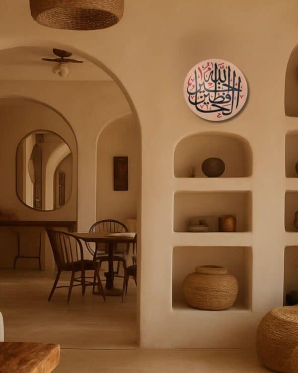 Elegant home decor featuring built-in wall shelves with pottery and a cozy dining area.