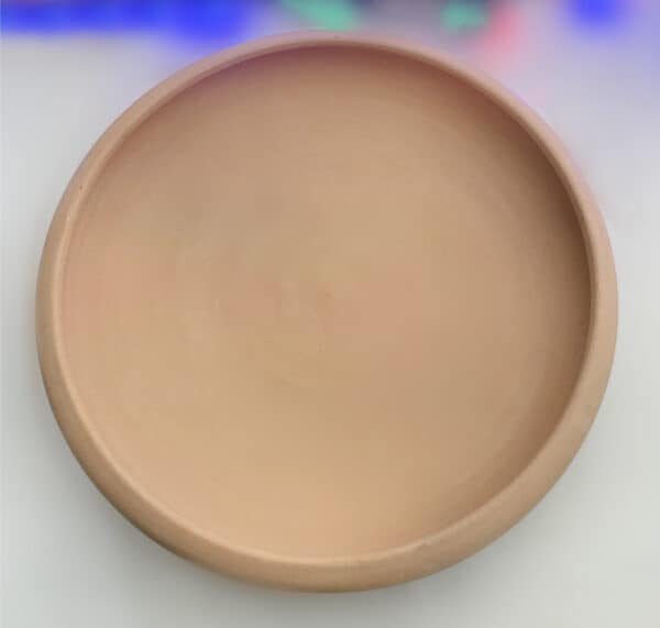 Clay Plate reverse side of an Arabian Art Piece and smooth surface, natural earthy tone.