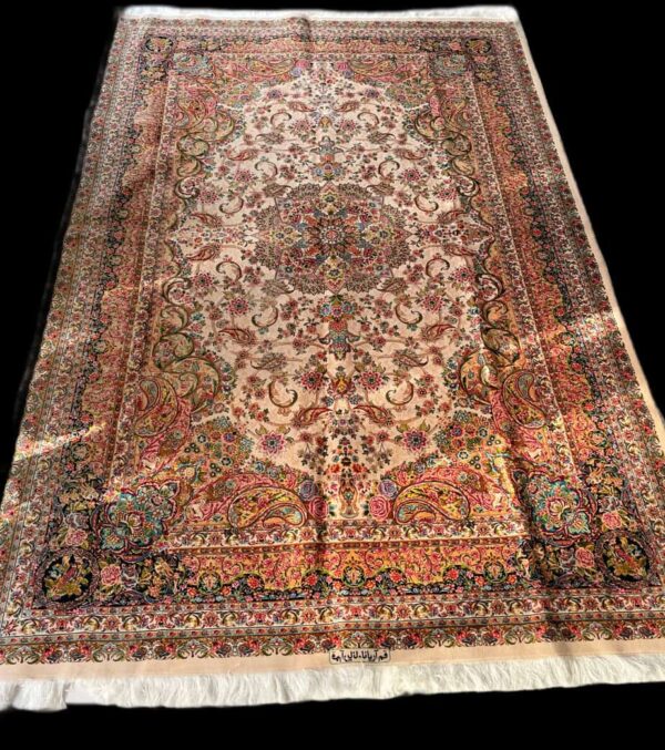 Elegant Silk Persian rug featuring intricate floral and paisley designs in vibrant colours. Perfect for adding a touch of luxury and tradition to any living space.