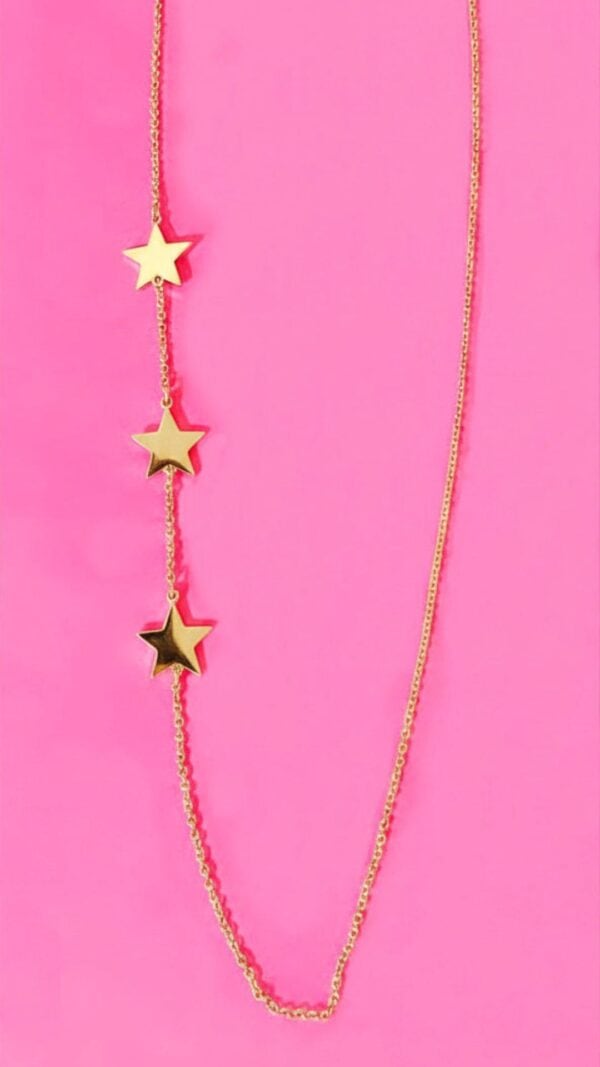 Gold star necklace with three star pendants on a fine chain, perfect for trendy fashion and everyday wear.