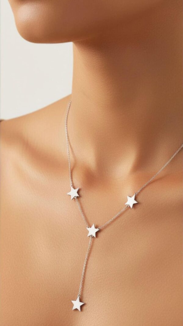 Elegant star-shaped pendant necklace on a woman's neck, showcasing stylish jewelry for women.
